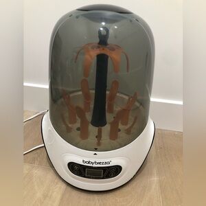 Never used brand new baby Breeza bottle sterilizer